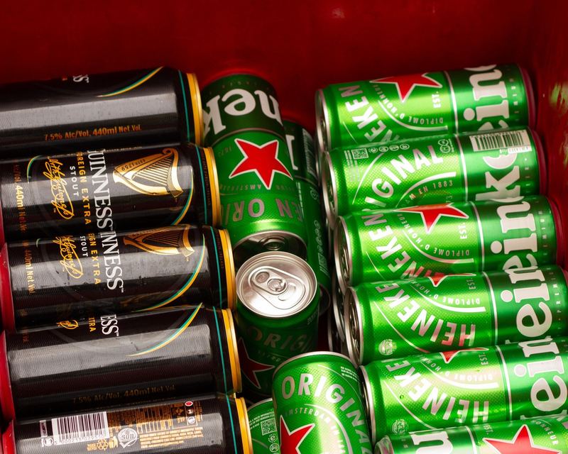Assorted drinks chilling in a cooler